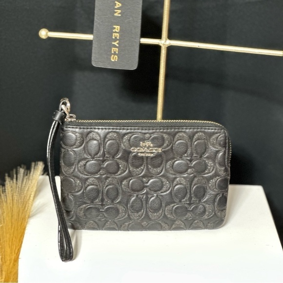 Coach Handbags - Coach Wristlet color Black